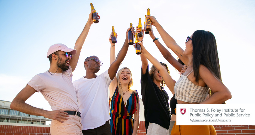 people toasting with beer